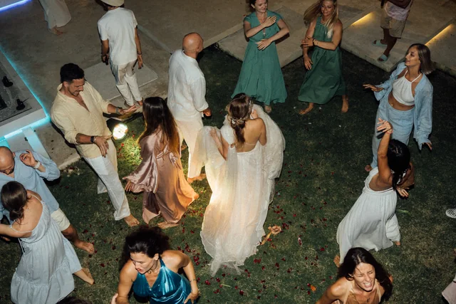 Guests dancing at golden hour